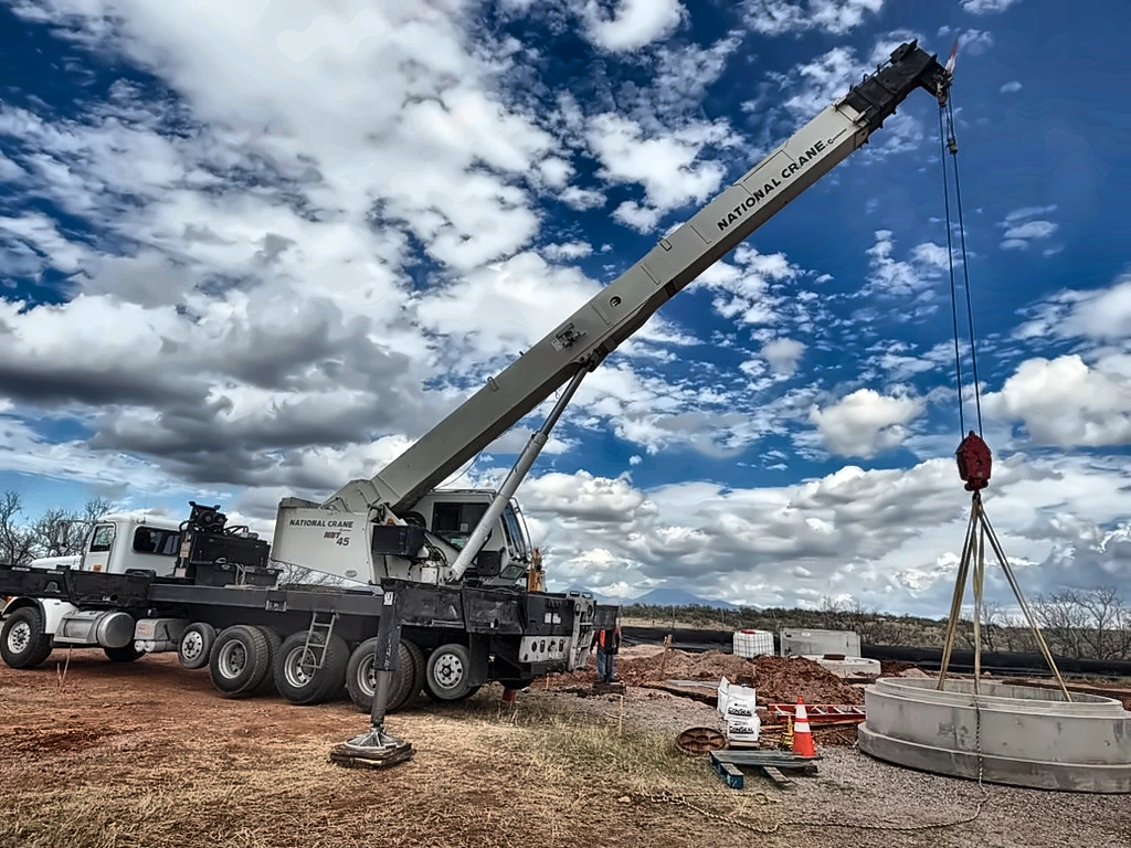 Easy Lift crane placing a concrete component at a jobsite