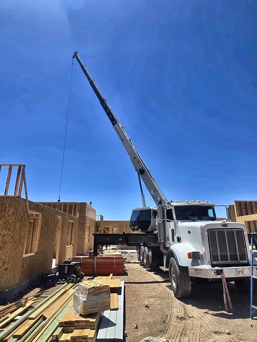 Easy Lift crane operating between framed buildings